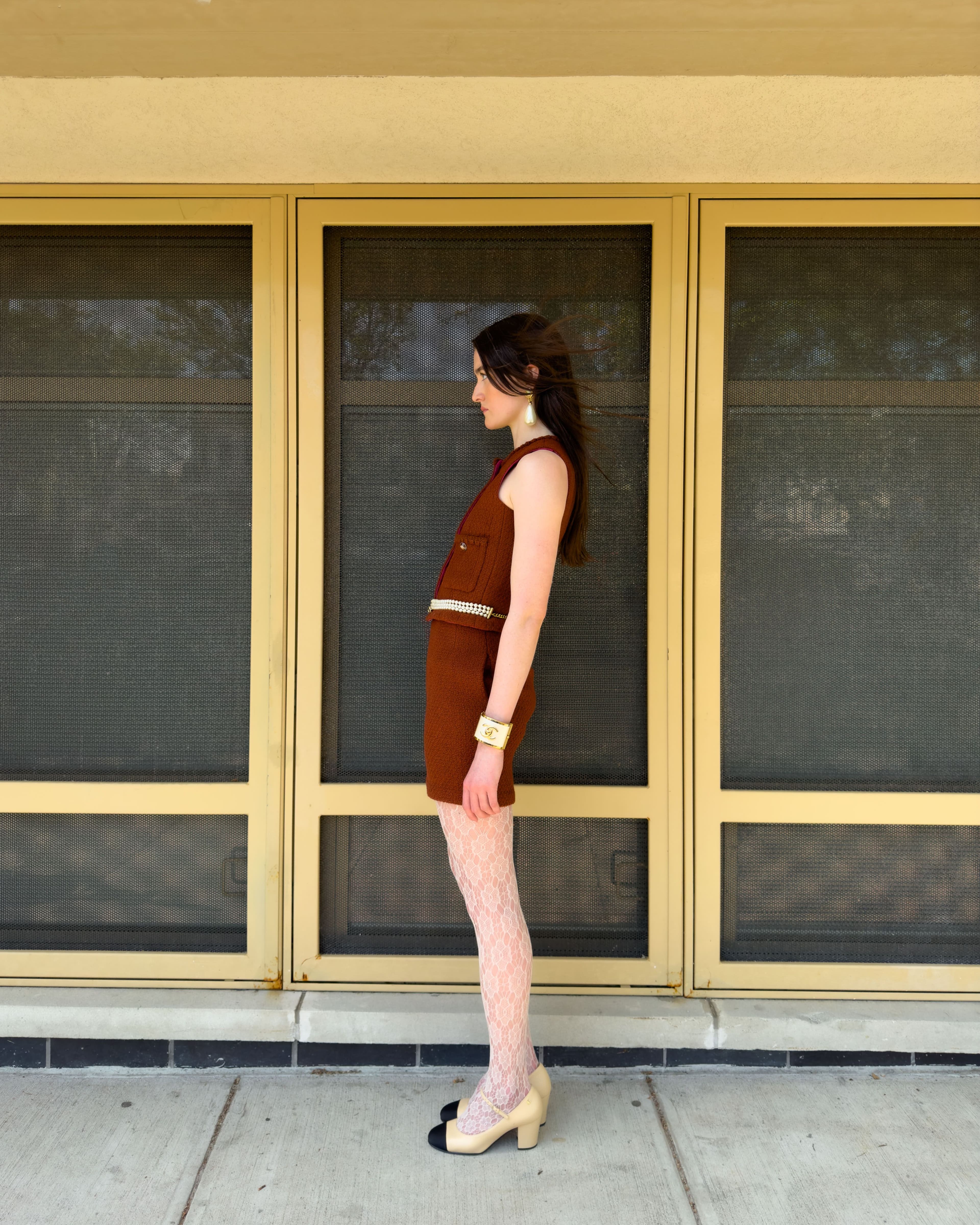 All CLOTHING, SHOES, and JEWELRY by ,Chanel. ,TIGHTS by ,Calzedonia.