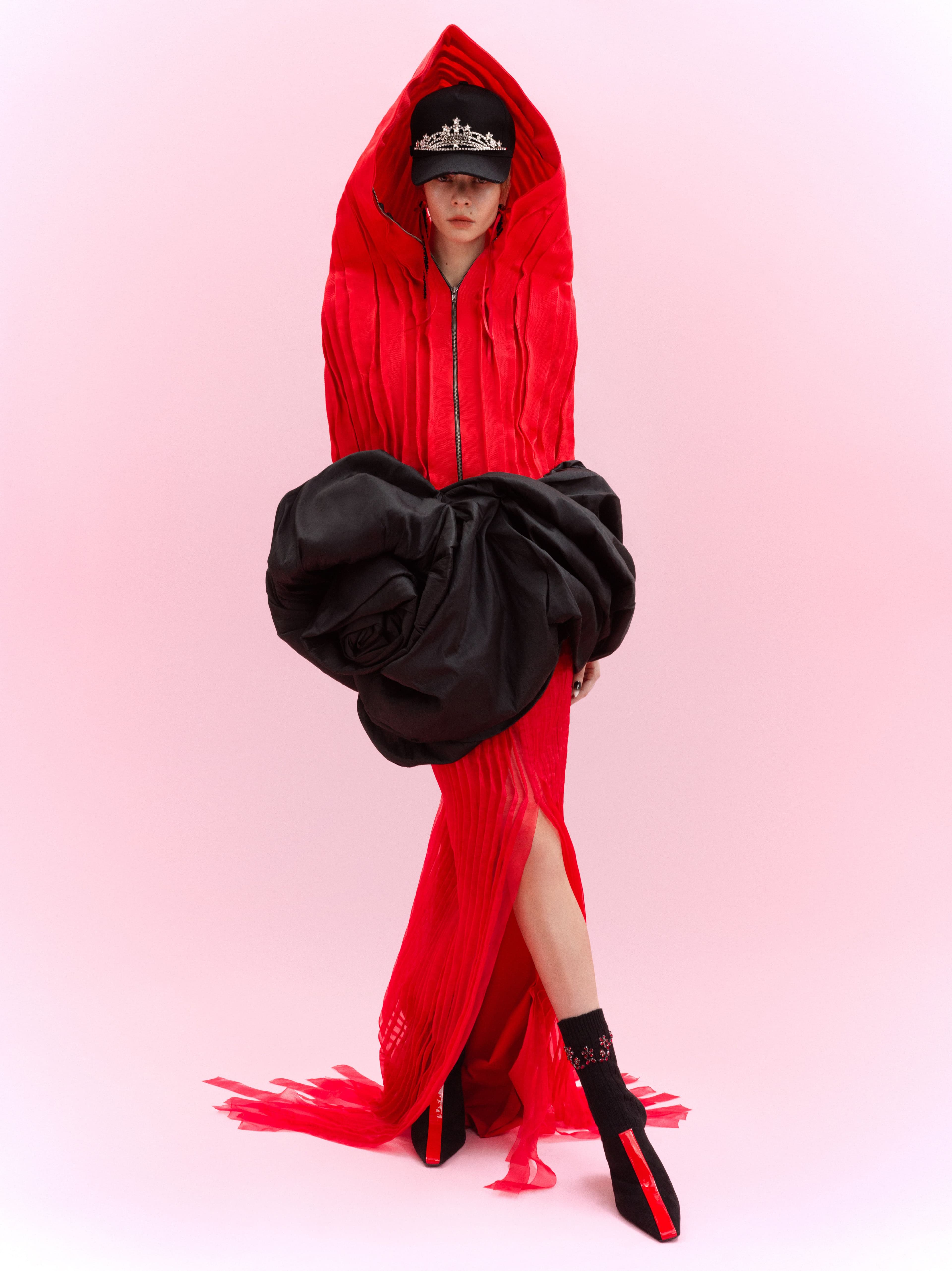 Top and skirt by Maximilian Raynor. Dress by Paula Mihovilović. Hat by Dsquared2. Socks and earrings by Simone Rocha. Shoes by Ferragamo.