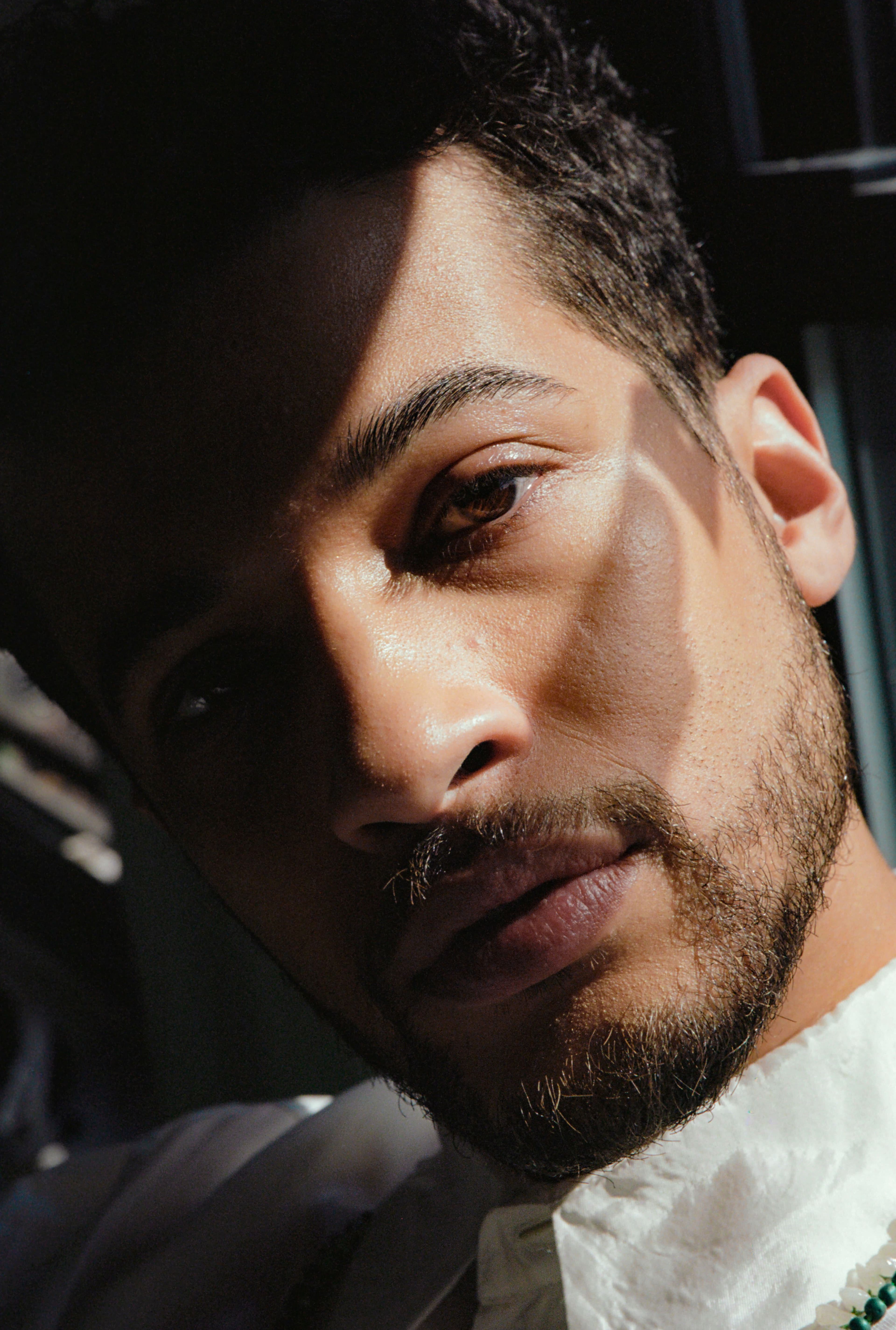 Beaded top from Arara Archive. Shirt by Dries Van Noten.