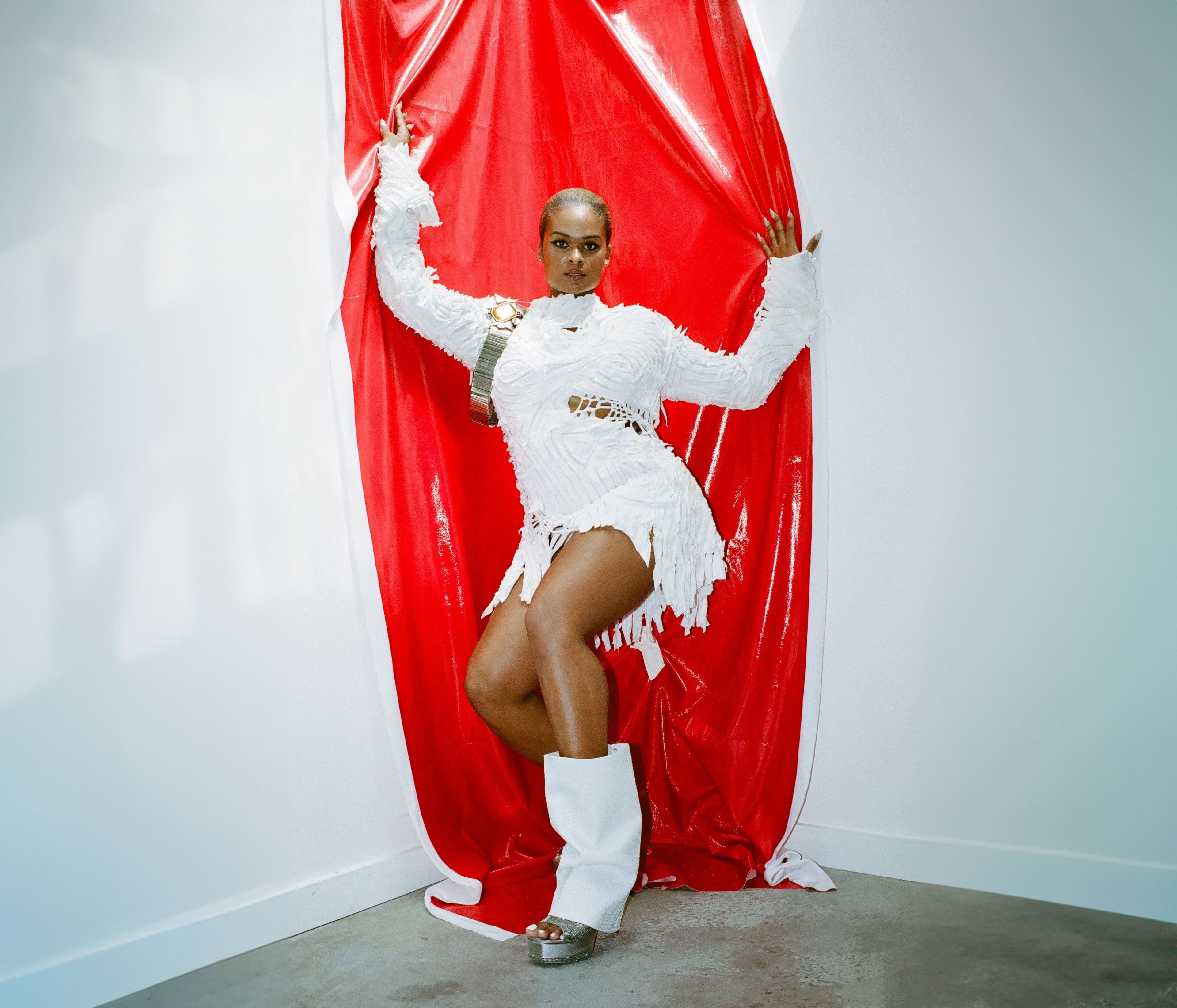 Dress by Collina Strada. Vintage belt from Cherry Vintage. Shoes by René Caovilla. All jewelry, stylist’s own.