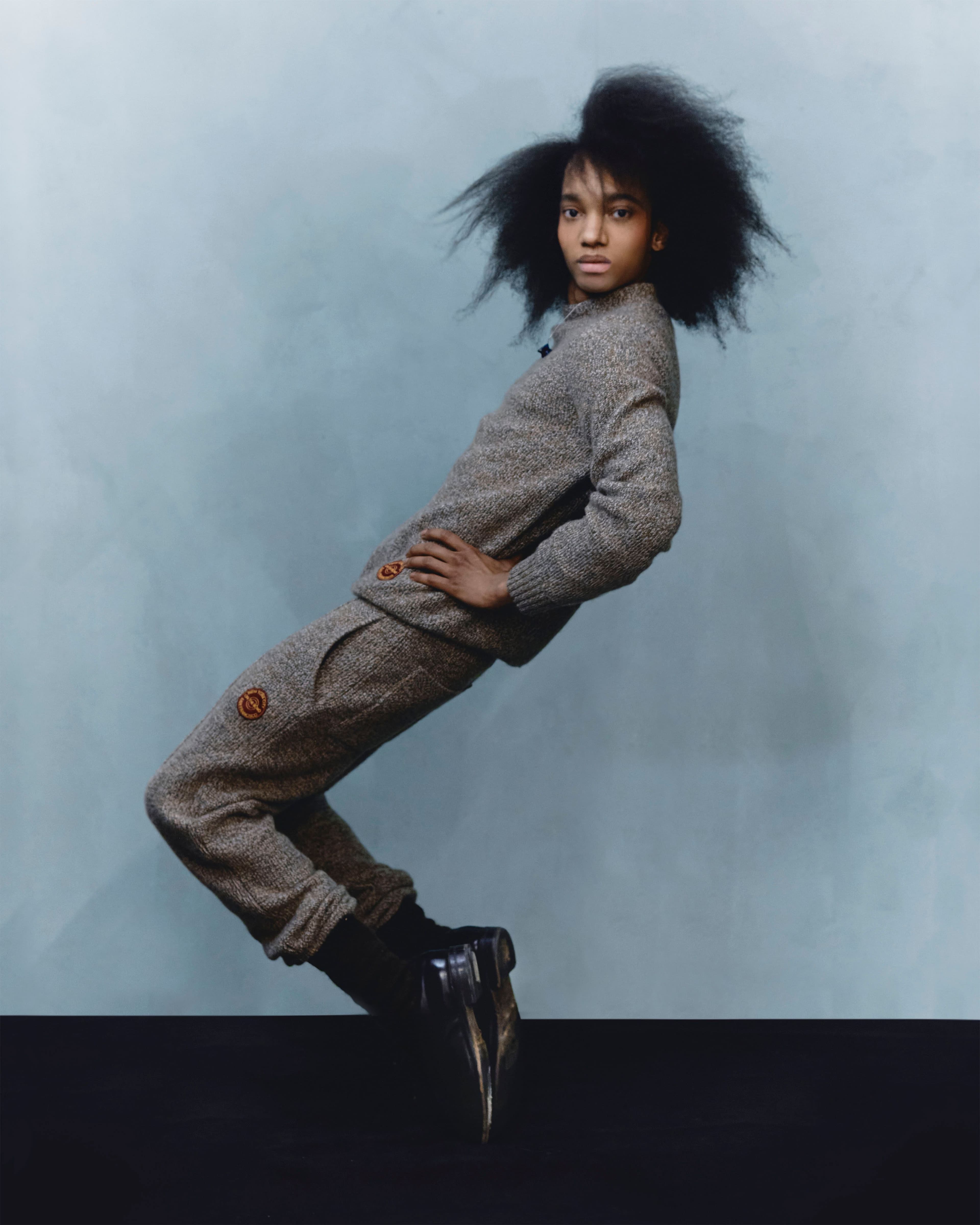 Sweater and pants by Dior Men. Shoes from the Costume Studio. Necklace and socks, stylist’s own.