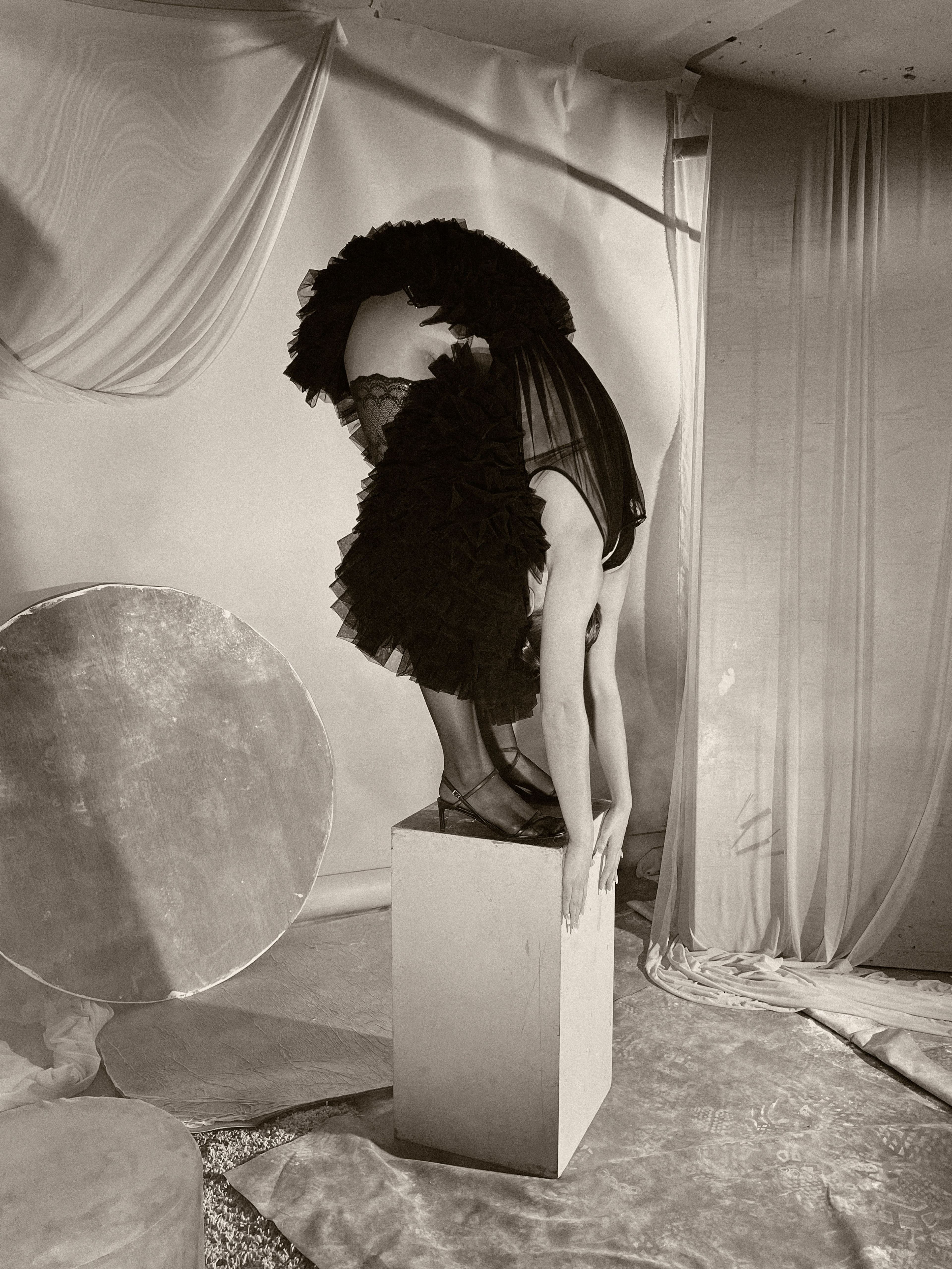 Dress by Noir Kei Ninomiya. Tights by Falke. Shoes by Celine by Hedi Slimane.