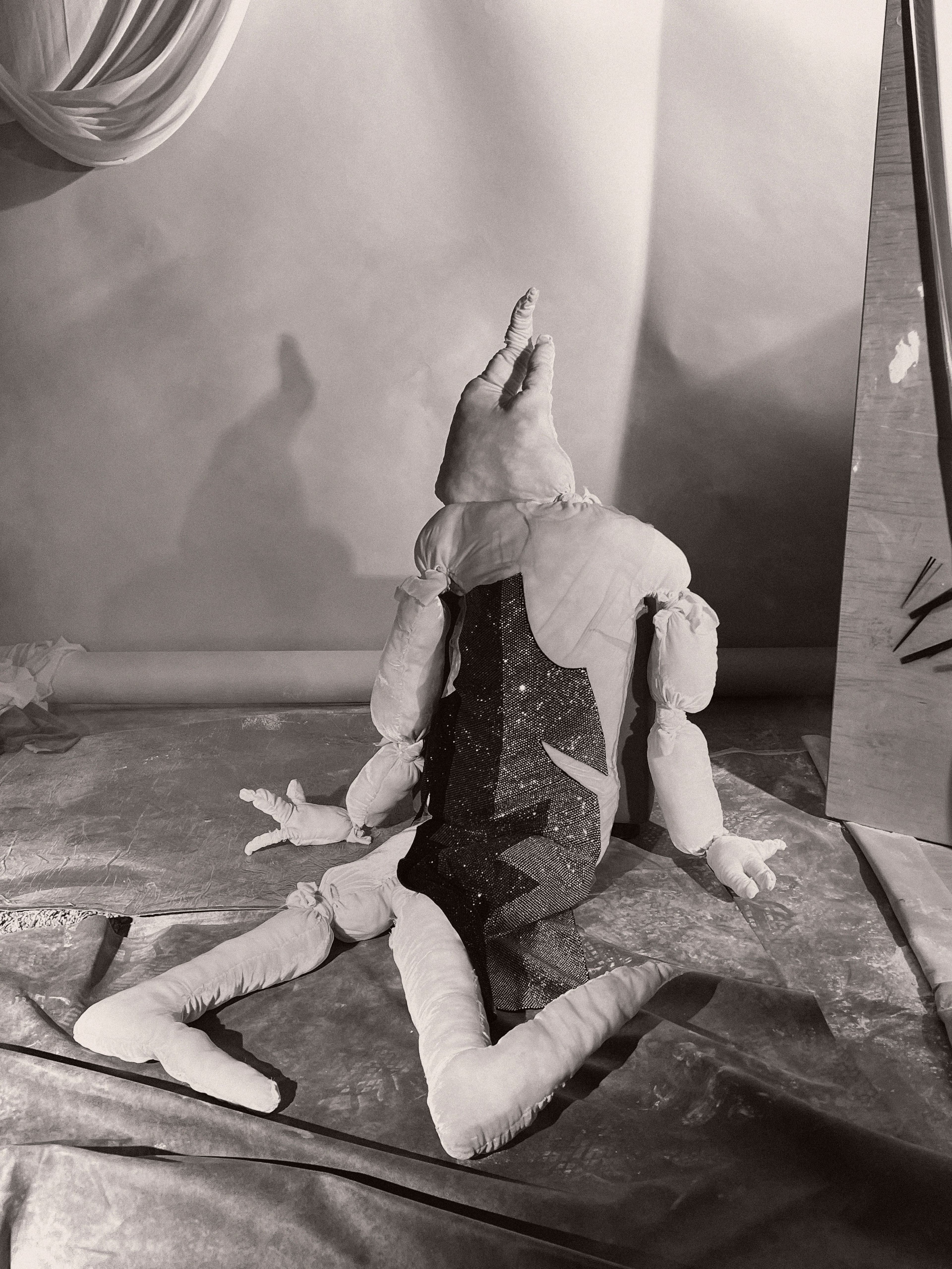 Dress by Duran Lantink. Sculpture: ,Velvet Knight,, Julian Farade, 2022.