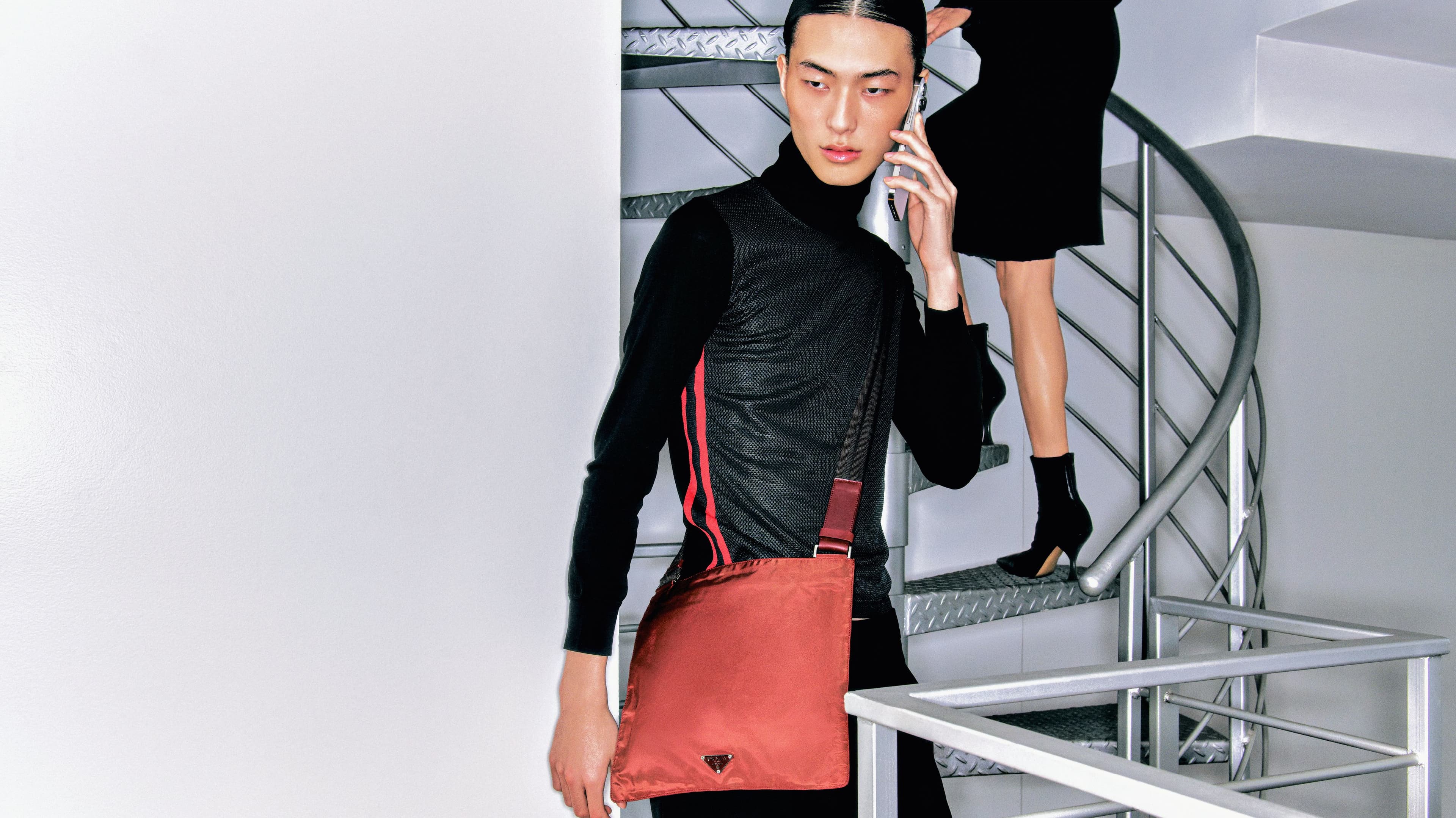 From left, Maruno wears vintage TOP by ,Comme des Garçons, and vintage PANTS and BAG by ,Prada., Wu wears vintage SKIRT by ,Jean Paul Gaultier.