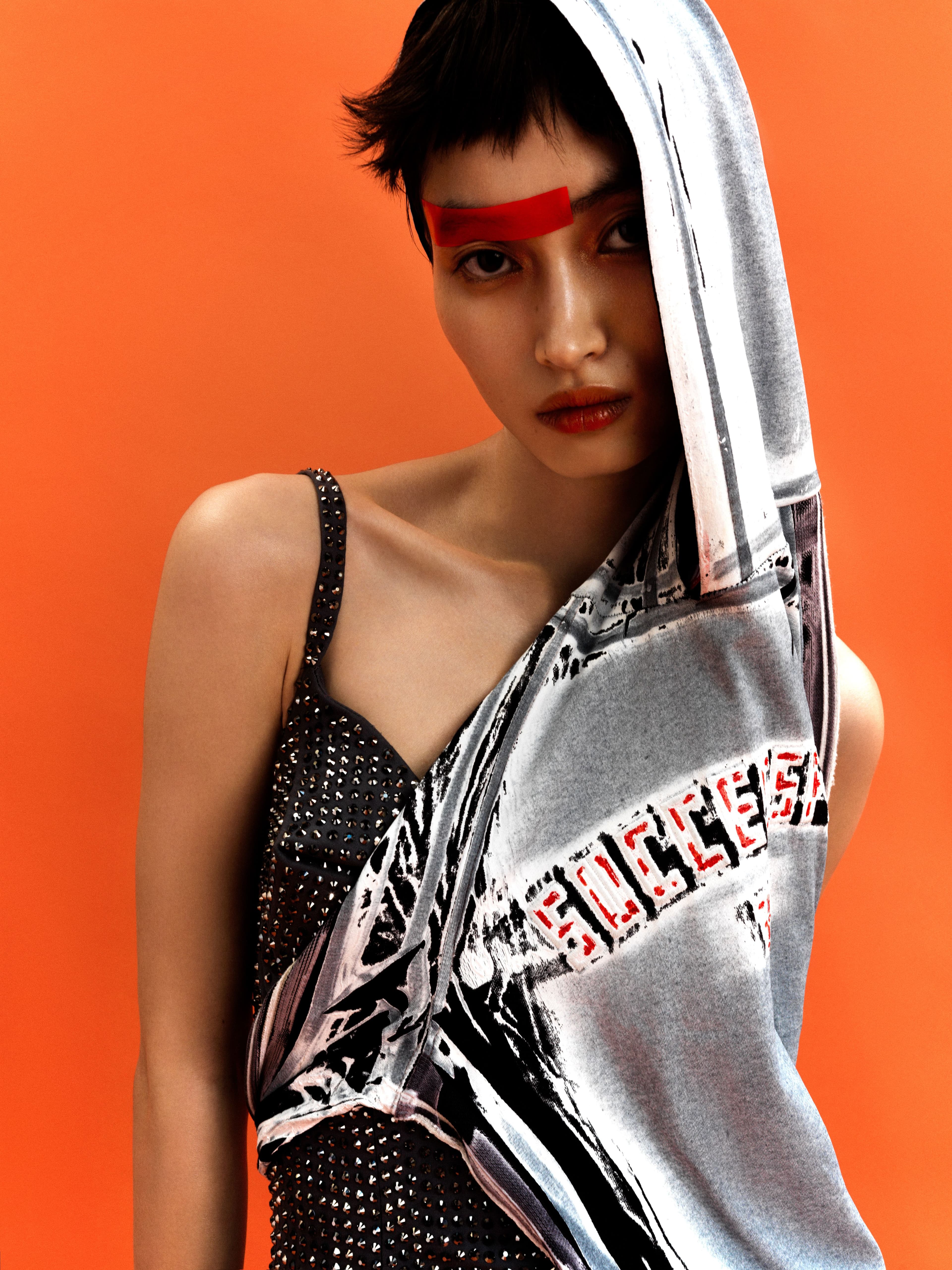 Dress by Diesel. Dress, worn underneath, by Area.