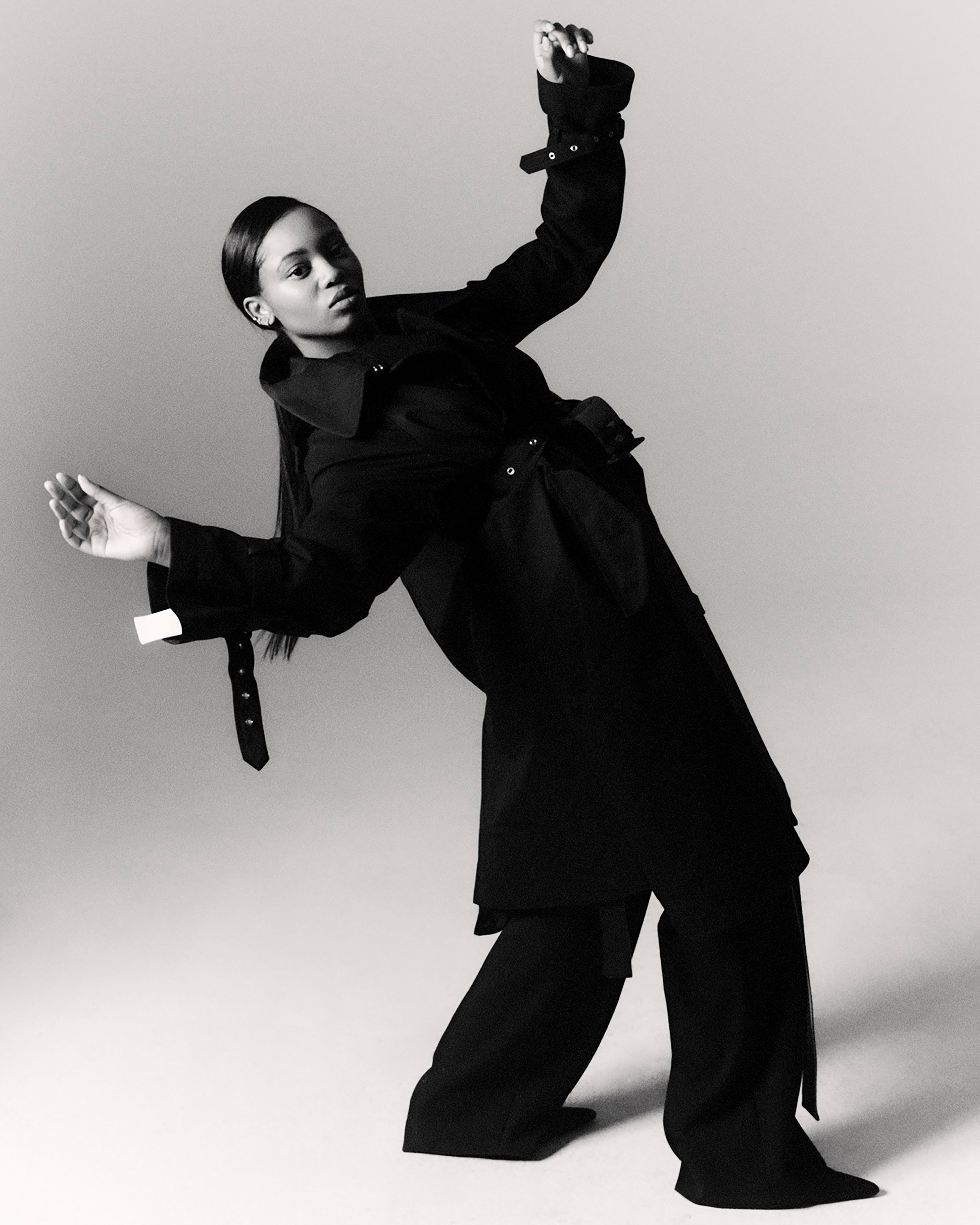 Trench coat by Sacai. Pants by Officine Générale.