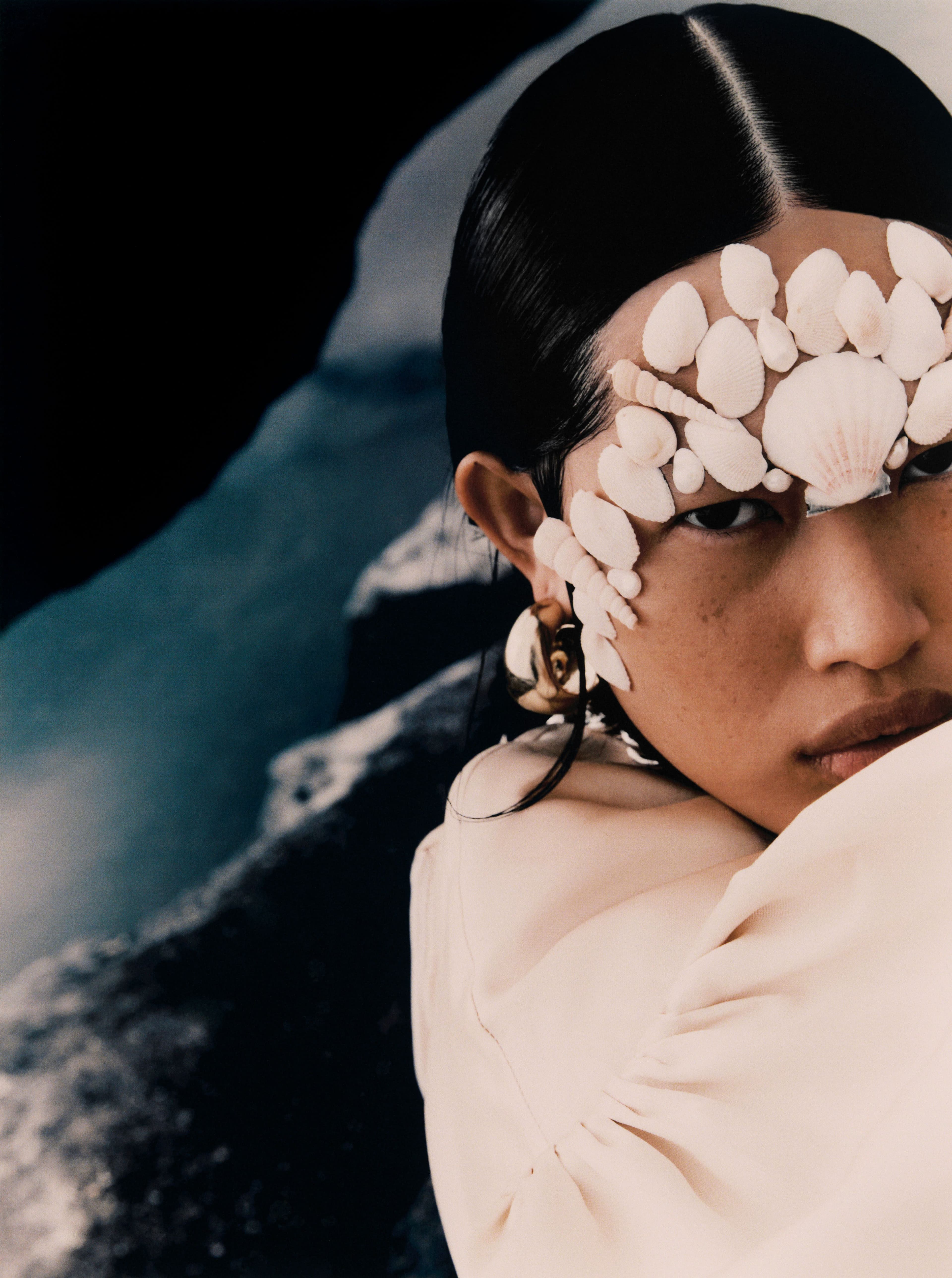 Dress by Jordan Dalah. Earrings by Dinosaur Designs.