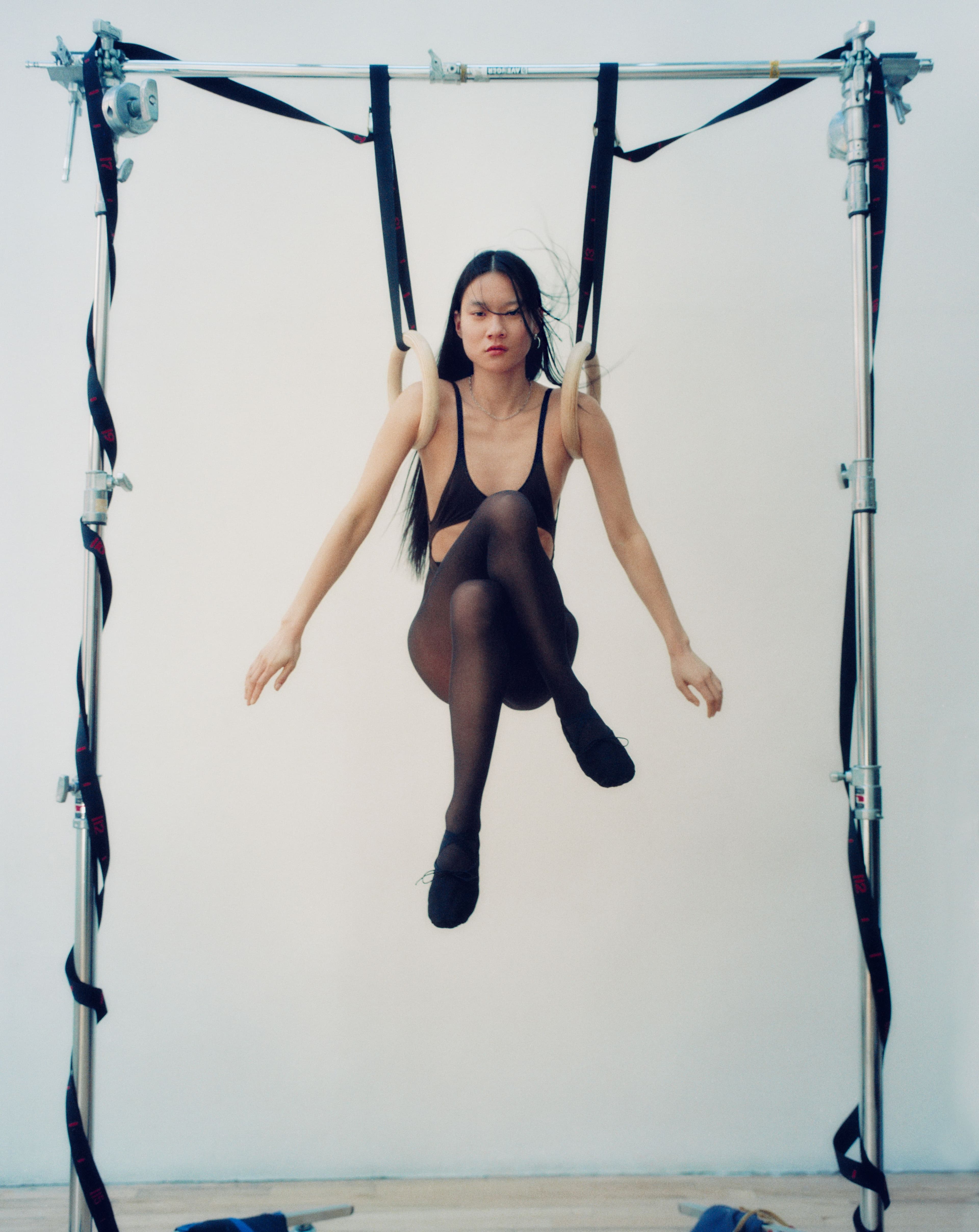 Bodysuit by Maryam Nassir Zadeh. Tights by Falke. Shoes by Capezio. All jewelry by Laura Lombardi.