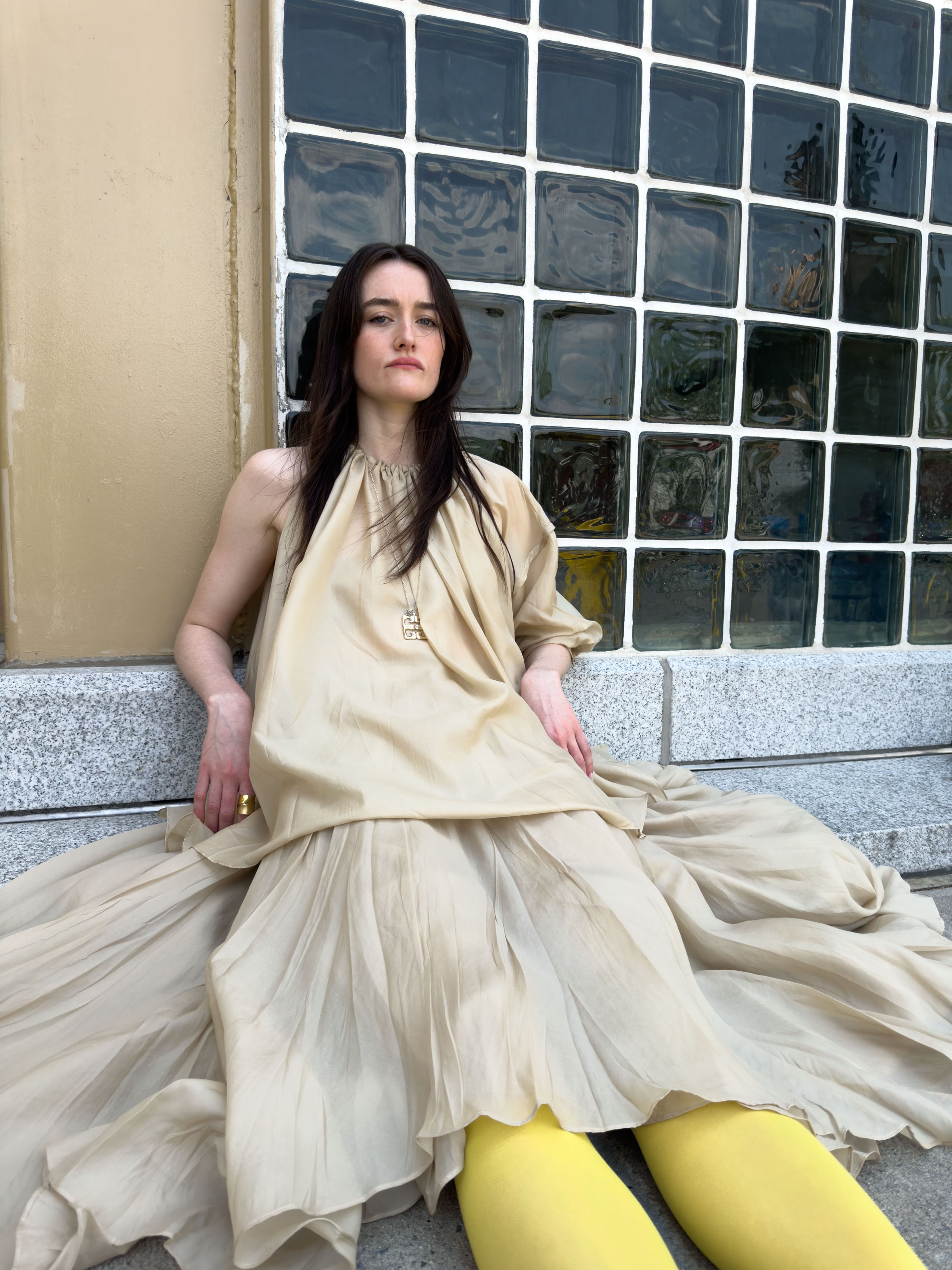 All CLOTHING and SHOES by ,Ferragamo. ,TIGHTS by ,Fogal. ,NECKLACE by ,Givenchy. ,RING by ,Completed Works.