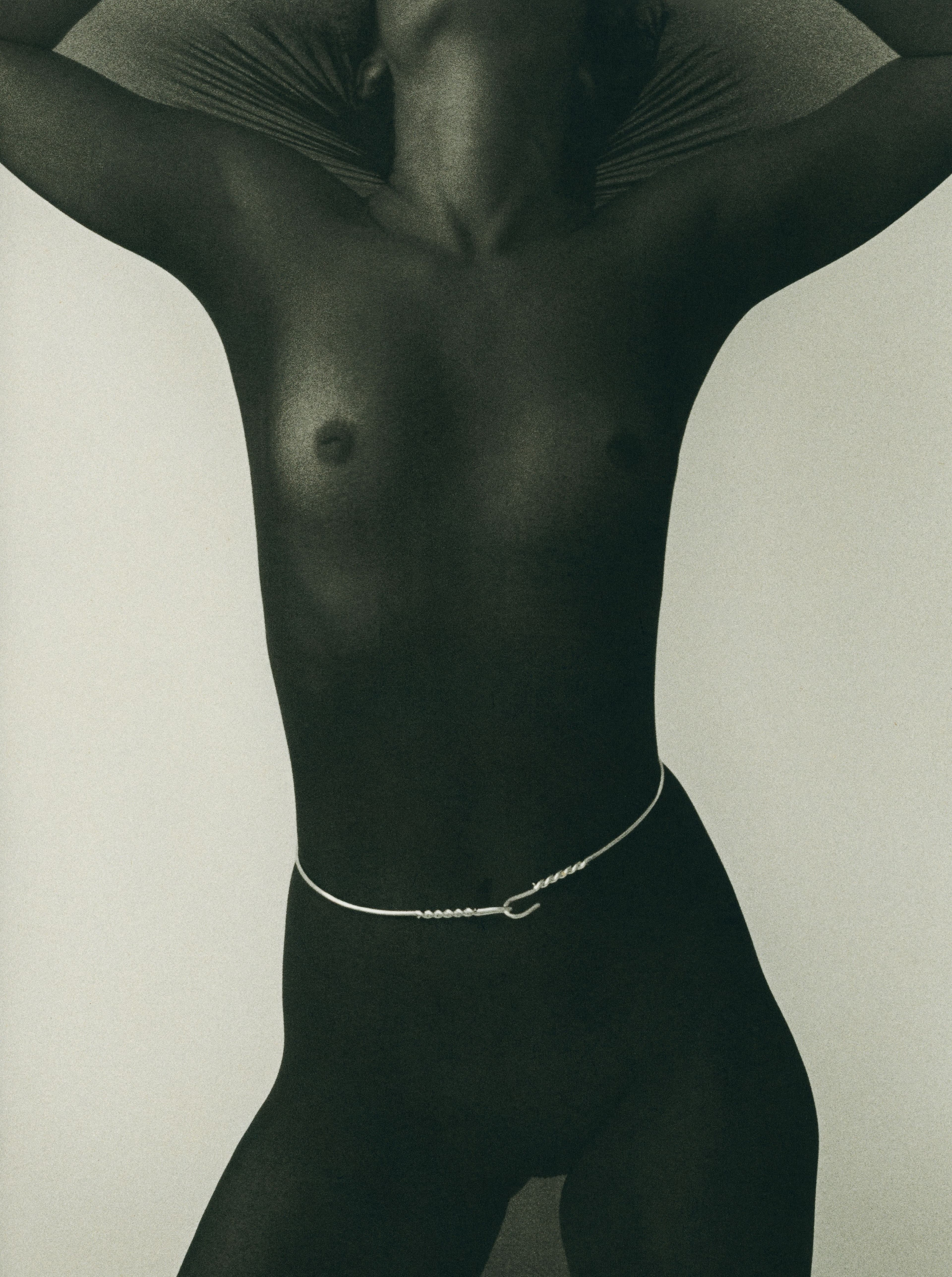 Vintage belt by Alexander McQueen, Pre-Fall 2014. . Subverting the fashion world’s steadfast hierarchy, Lee McQueen emerged in the nineties with a soulfully dark and poetic vision, framed by his Scottish heritage and articulated with intricate craftsmanship. Since his death in 2010, Sarah Burton, McQueen’s assistant of fourteen years, has continued to carry the brand forward in today’s landscape. The twisted wire belt, designed to be worn gently over heavy wool tailoring, illustrates the delicate and uncomfortable tension of being held, bound, and restrained. This piece is also reminiscent of the seventeen-year collaboration between McQueen with jewelry designer Shaun Leane, specifically the Crown of Thorns headpiece from Fall 1996.