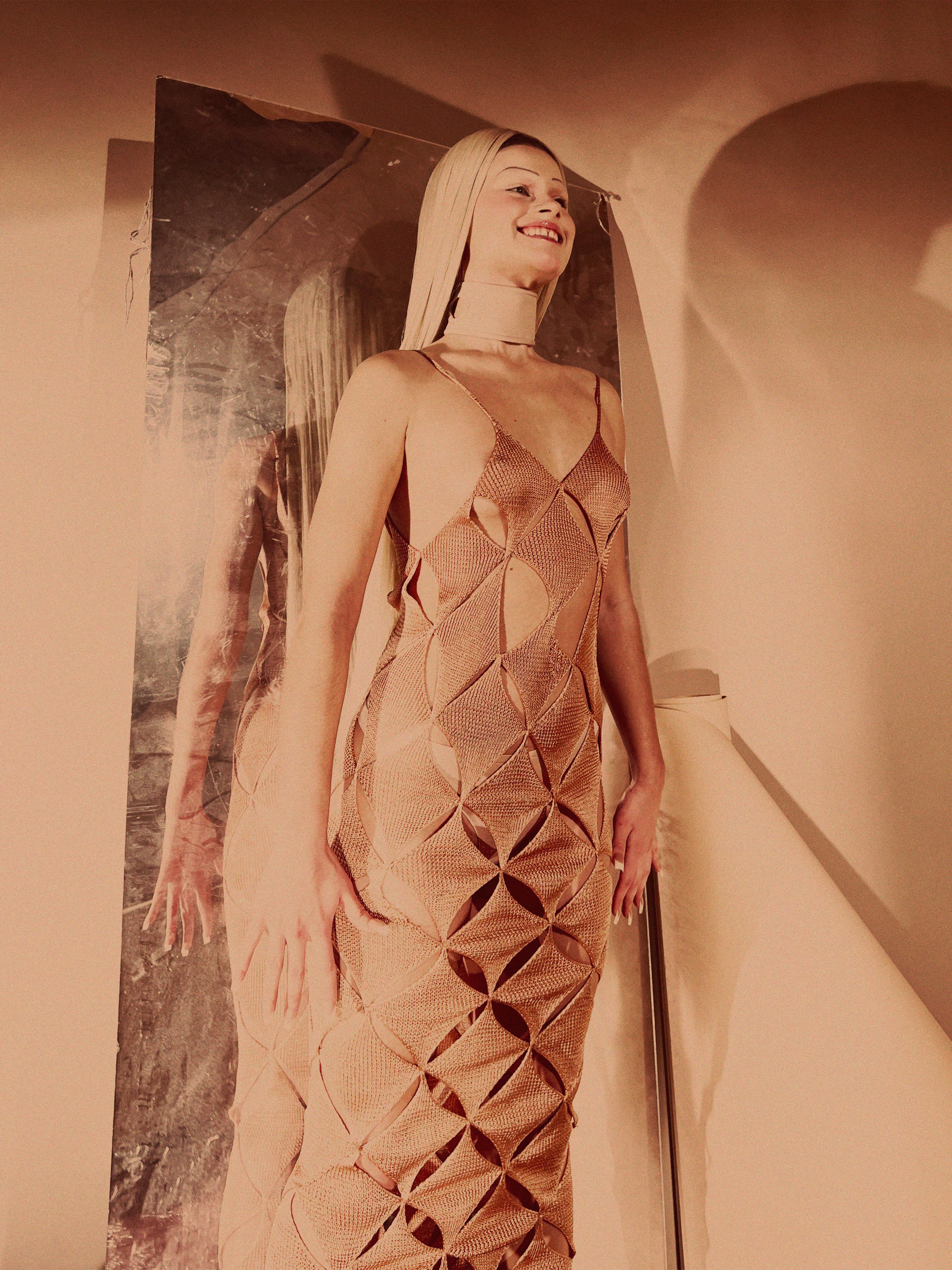 Dress by Isa Boulder. Choker by Burberry..