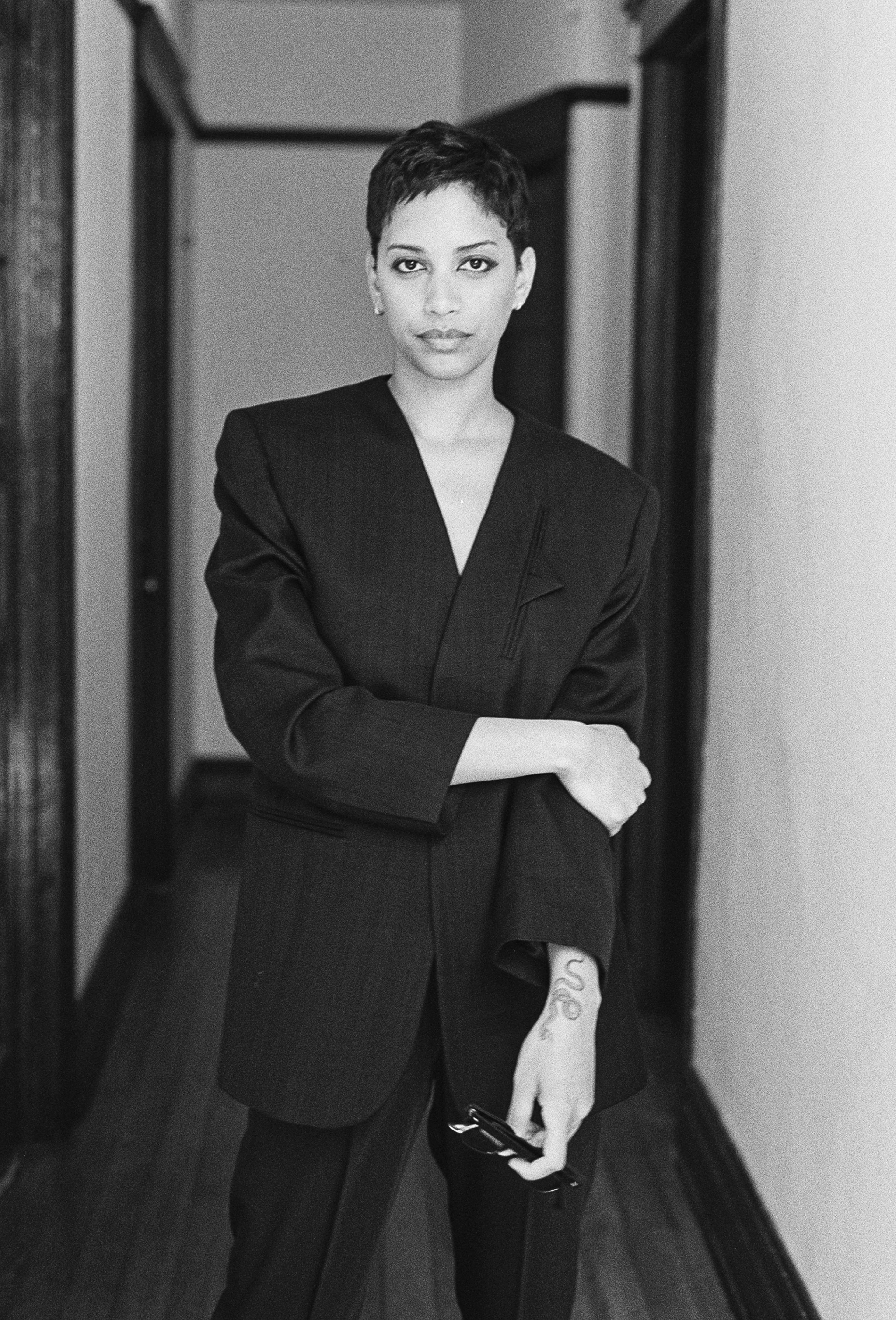 All clothing by Jil Sander. Sunglasses, in hand, by Celine.