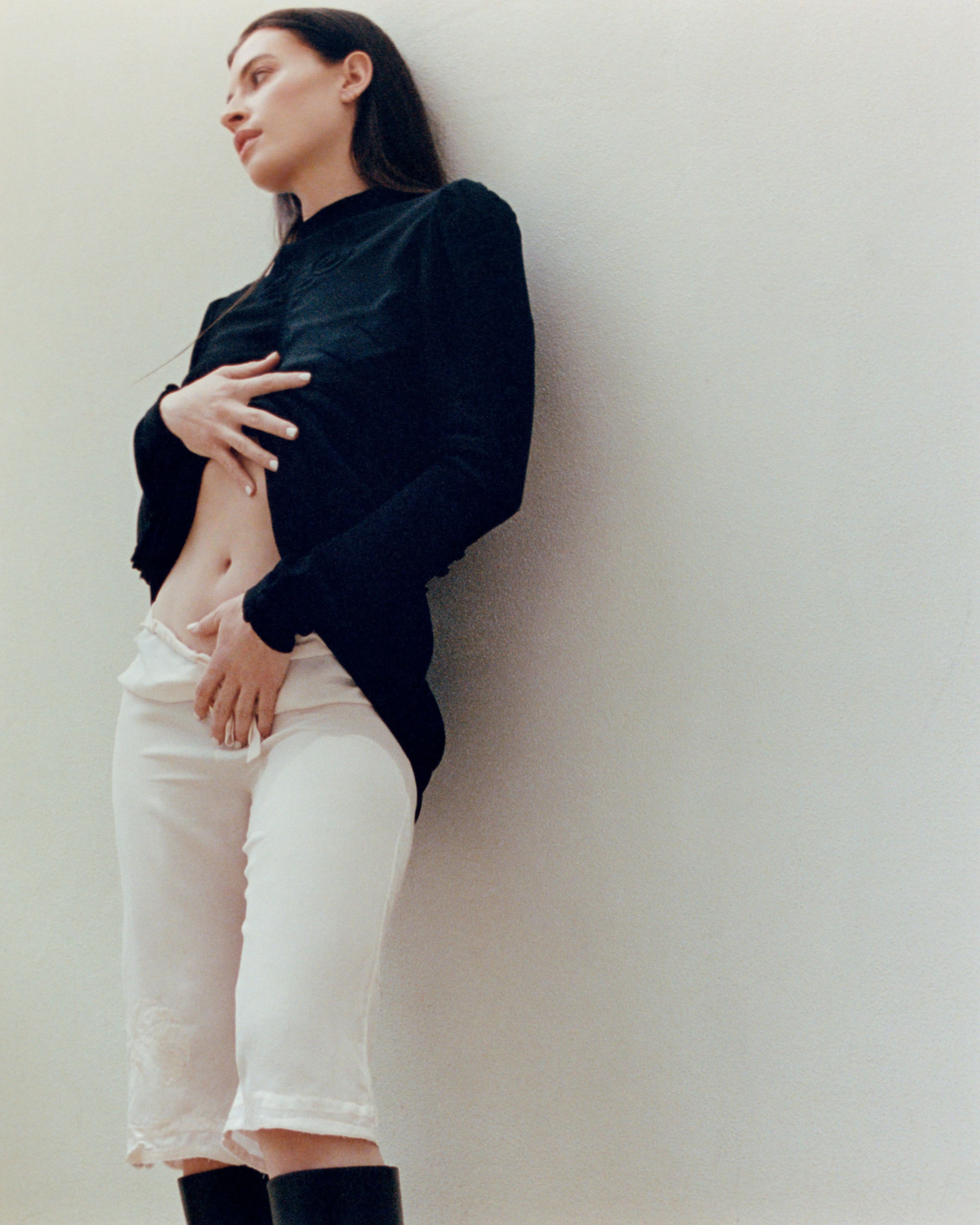 All CLOTHING and BOOTS by ,Prada