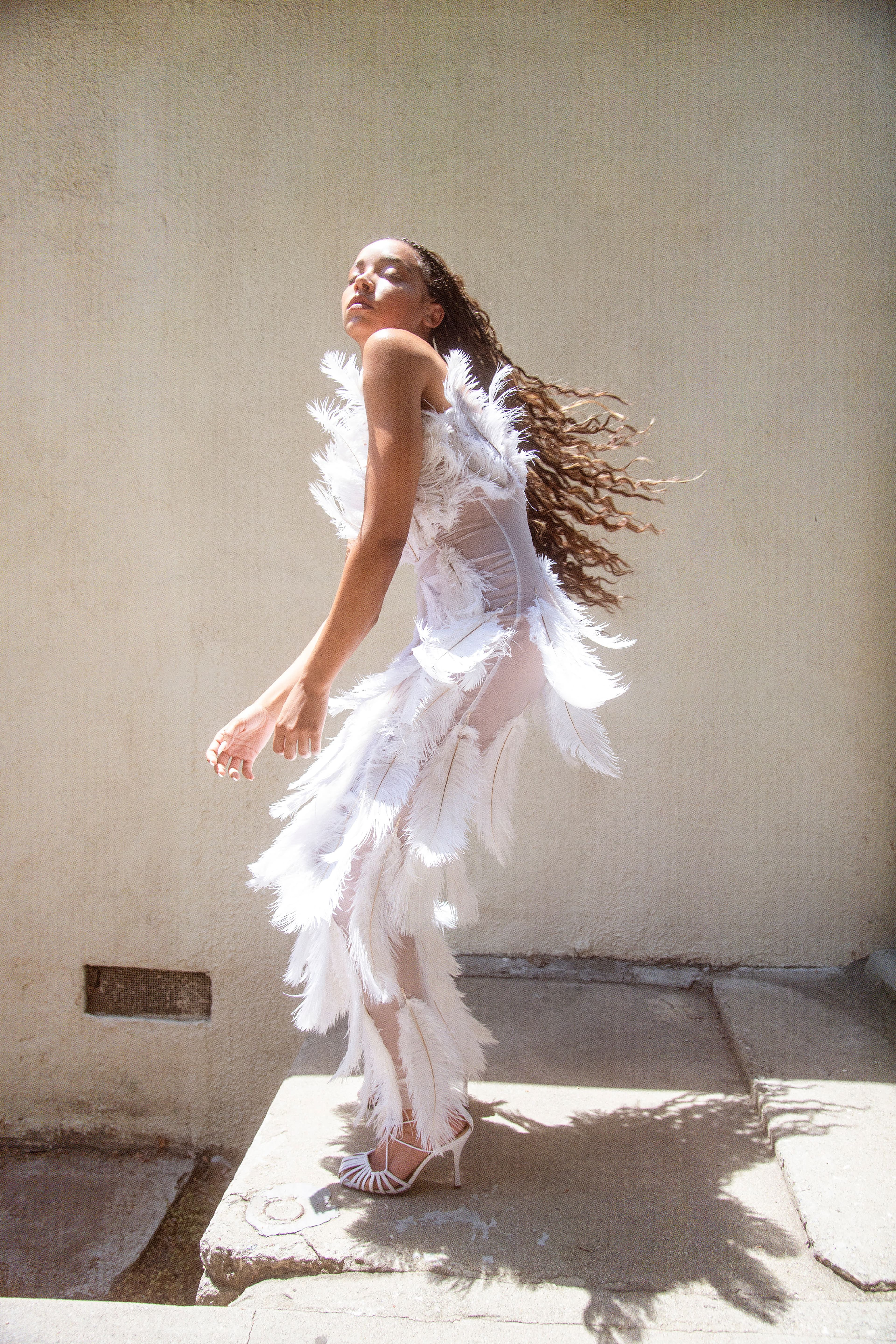 Dress by Tia Adeola. Shoes by Chelsea Paris.