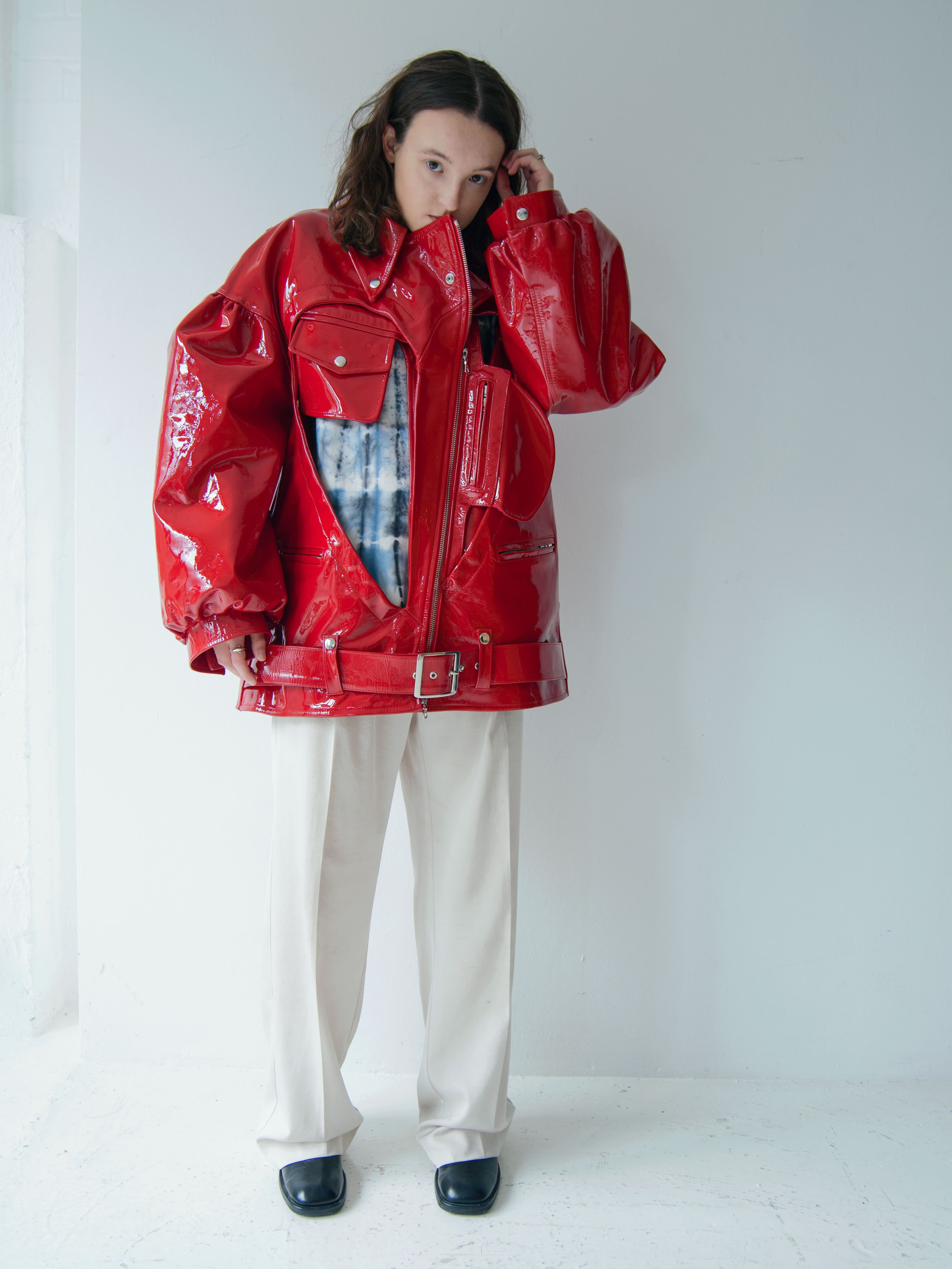 Jacket by Simone Rocha. Vintage t-shirt and pants, stylist’s own. Boots by Our Legacy.