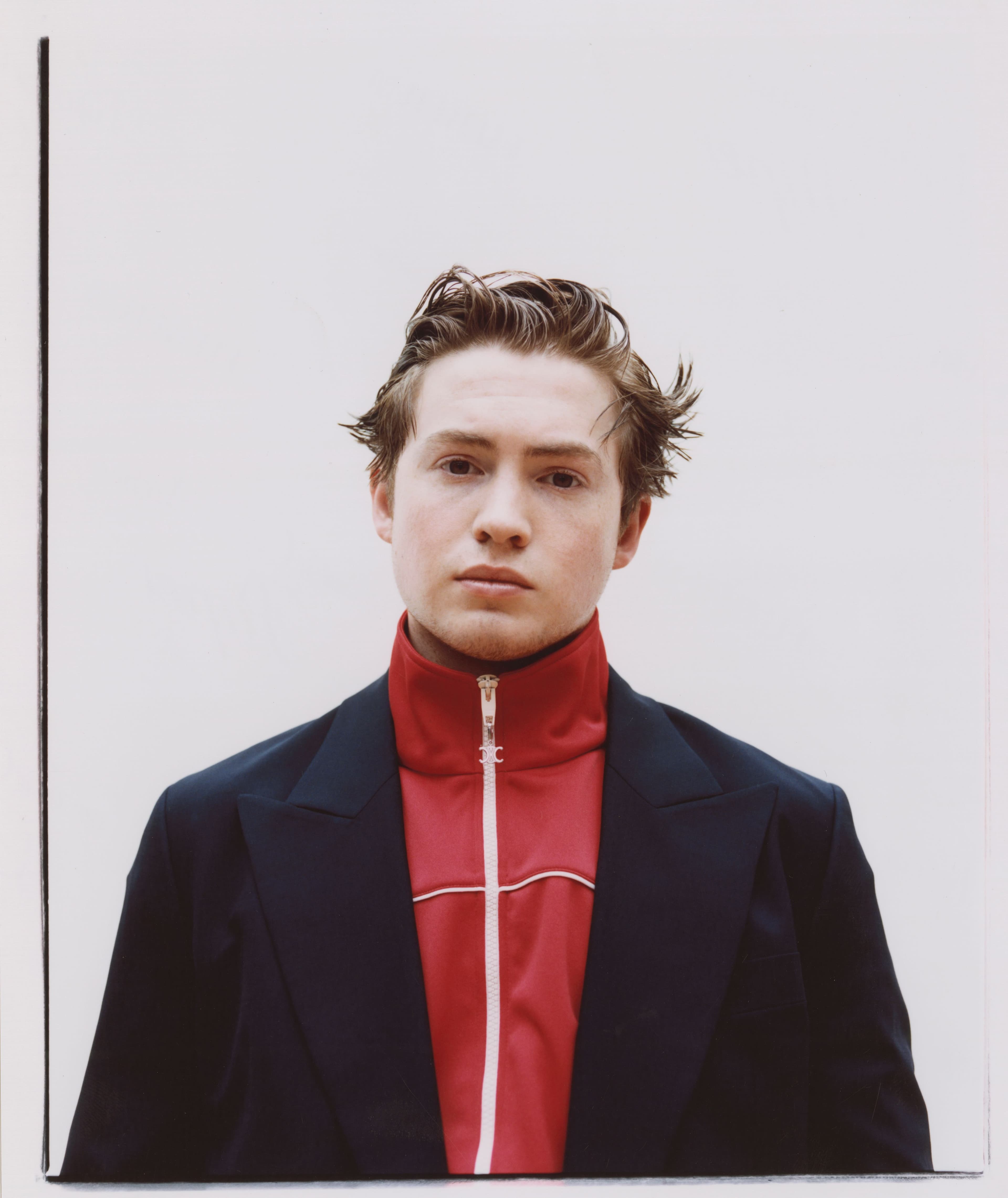 Jacket by Tommy Hilfiger. Jacket, worn underneath, by Celine.