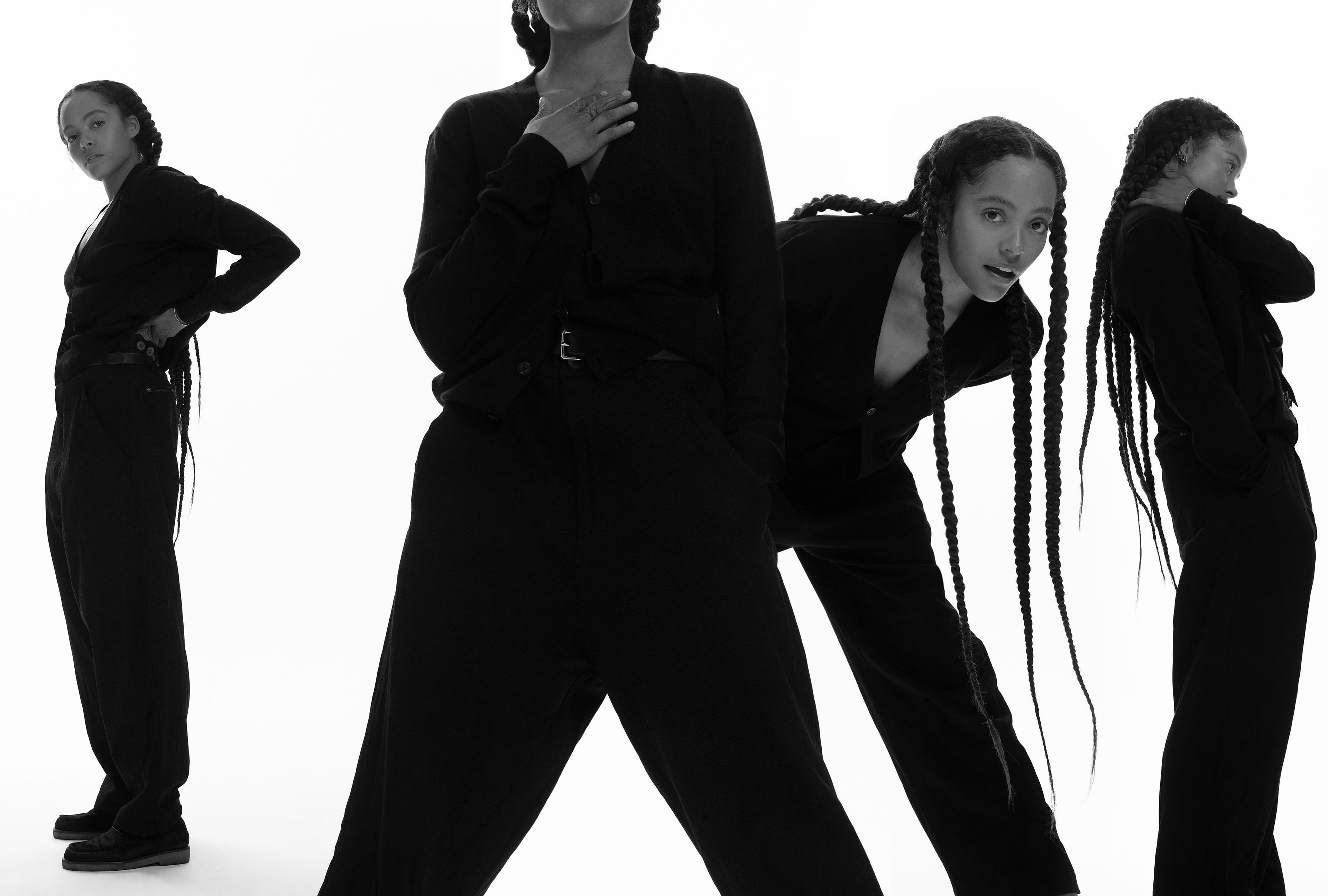 Vintage sweater by Burberry. Vintage pants by Comme des Garçons. Vintage belt by Prada. Vintage shoes by The Row.