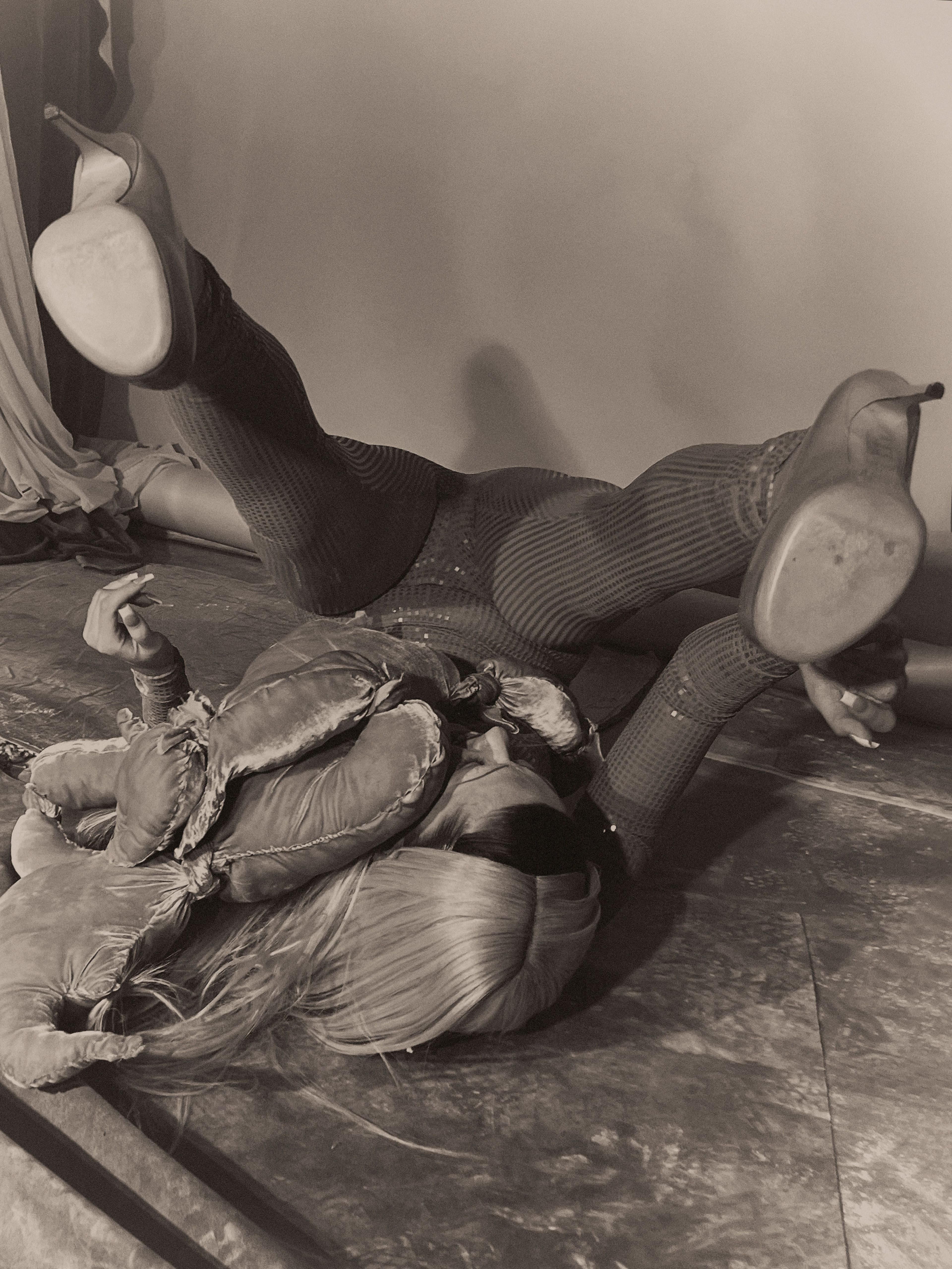 Top and pants by AZ Factory. Vintage shoes by Martin Margiela from Passage Contemporain..
Sculpture: ,Velvet Knight,, Julian Farade, 2022